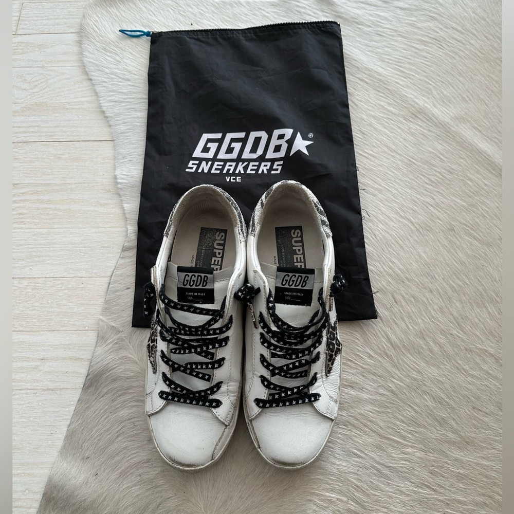 Golden Goose Superstar sneaker with rare star laces and crystal studs.